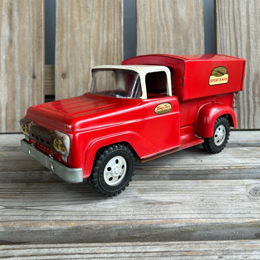 Red Tonka Truck sportsman edition. Comes with camper and trailer.